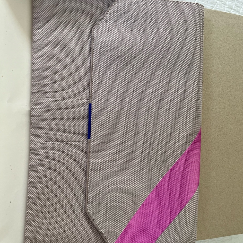 Rothy's Pink and Gray Laptop Case with Modern Design